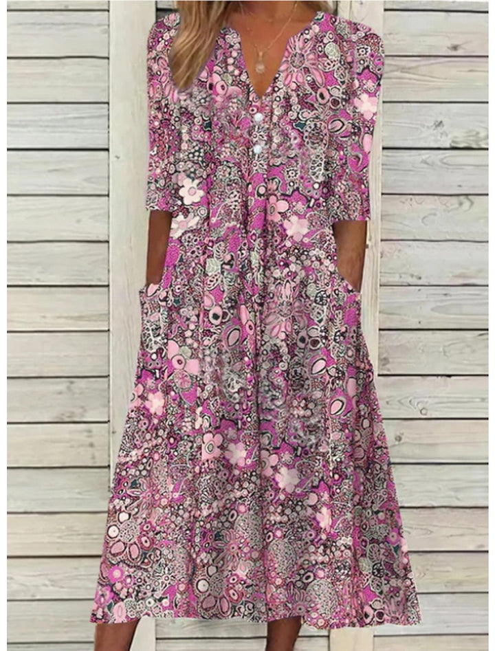 Nessa - bloemen midi jurk met zakken