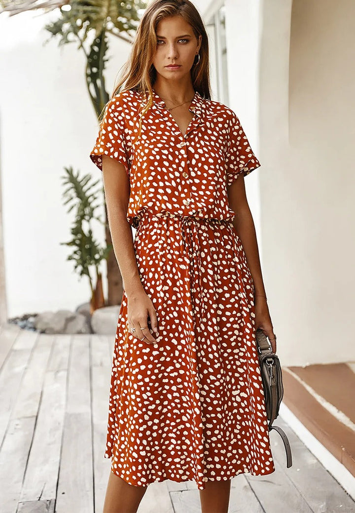 Doris - stijlvolle midi-jurk met elastische tailleprint