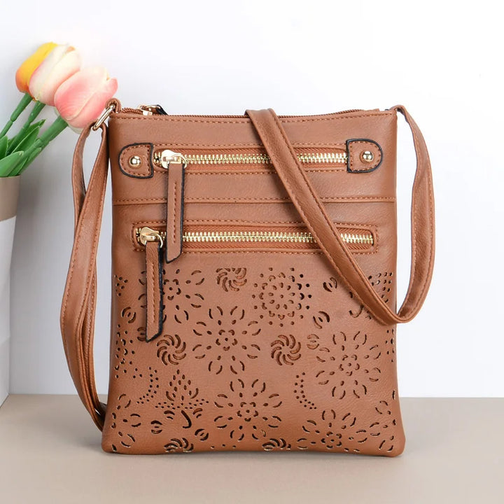 Vera - holle bloem crossbody tas