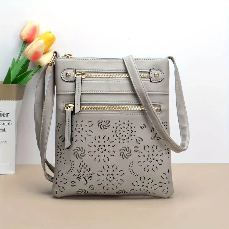 Vera - holle bloem crossbody tas